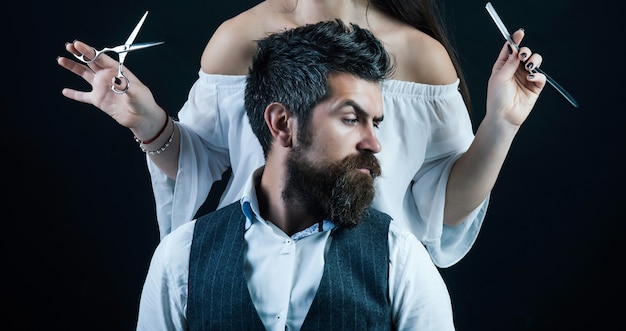 Bearded man modern man with classic long beard barber straight razor barbershop shaving in barber shop mustache men