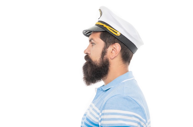 Bearded man profile portrait Serious man wearing captain hat Man profile face with beard and moustache isolated on white