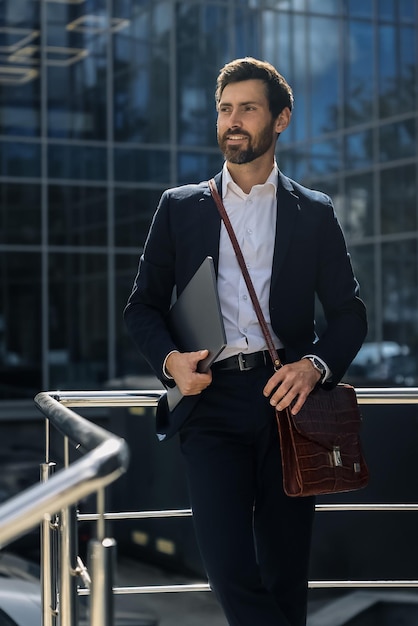 Bearded man in a stylish suit looking confident