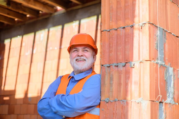 Bearded man in suit with construction helmet portrait of handsome engineer construction worker in