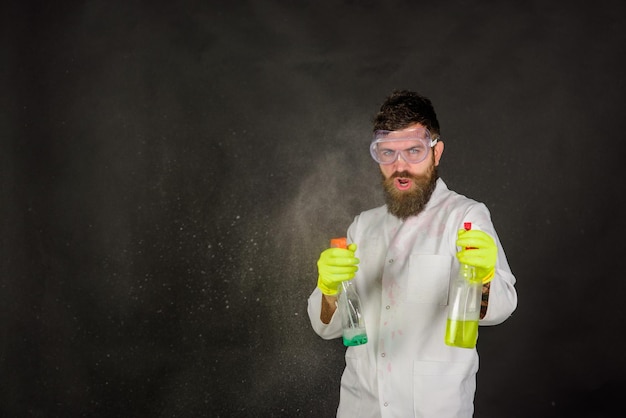 Bearded man with cleaning equipment bearded man with cleaning spray bearded man in uniform and