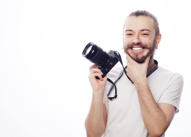 Bearded man with a digital camera