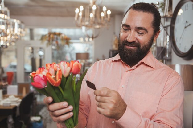 Bearded mature man shopping at home goods store