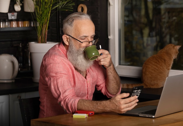 Bearded Senior Businessman work Laptop