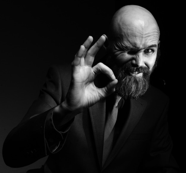 bearded in a suit and tie, businessman