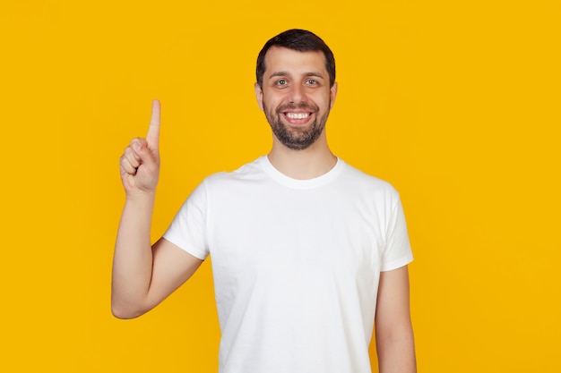 bearded young man with a white tee shirt