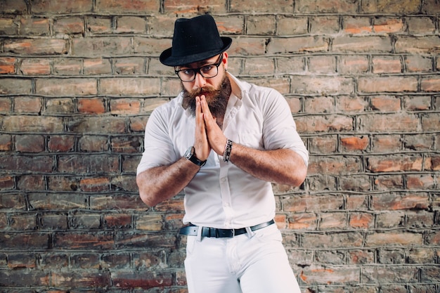 beared man wearing white