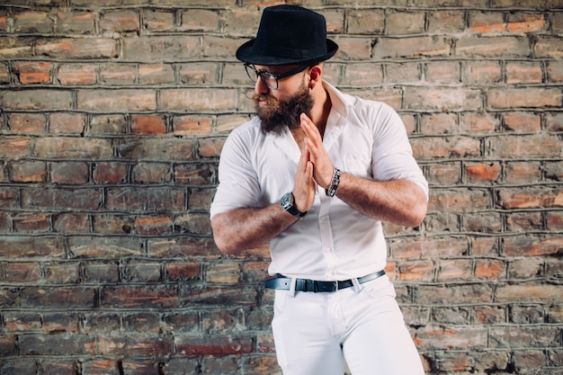 beared man wearing white