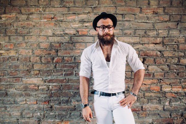 beared man wearing white