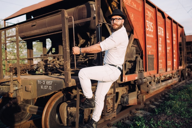 beared man wearing white