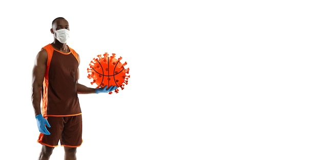 Beat the disease Sportsman basketball kicking punching coronavirus protection