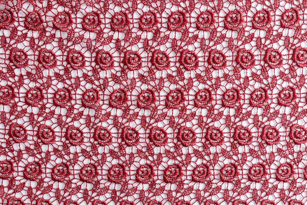 Beautiful abstract burgundy lace on a white background lace background with vintage pattern