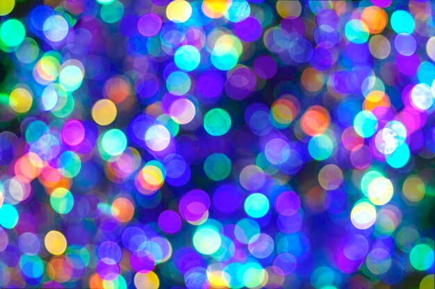 Beautiful abstract greeting card with blurred holiday lights on light background happy beautiful bac