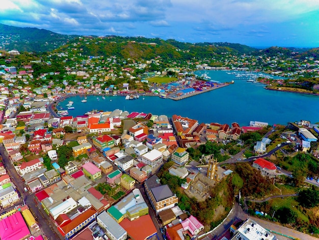 Beautiful aerial shot of the deep blue sky and sea towards the carenage st george