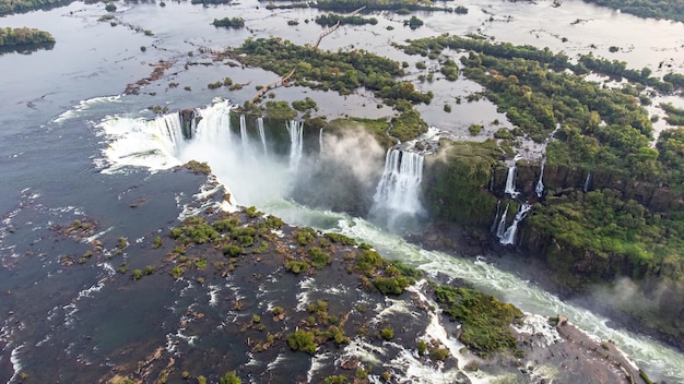 Beautiful aerial view of the Iguassu Falls from a helicopter, one of the Seven Natural Wonders of the World. Foz do IguaÃ§u, ParanÃ¡, Brazil