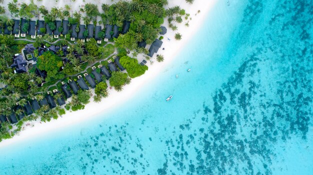 Beautiful aerial view of Maldives and tropical beach . Travel and vacation concept