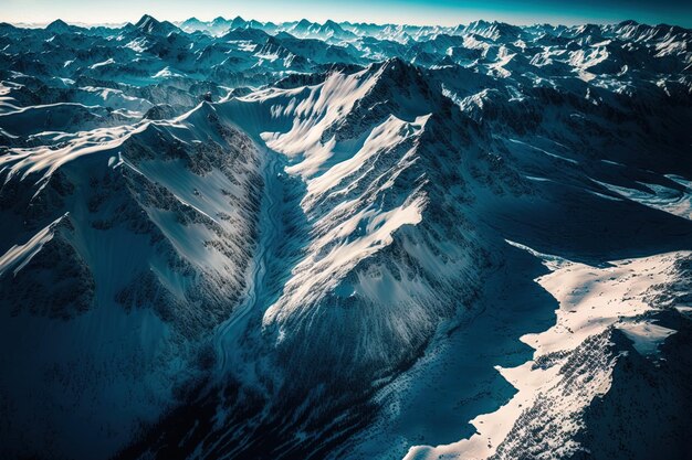 beautiful aerial view of snow covered mountains and an unimaginably blue sky