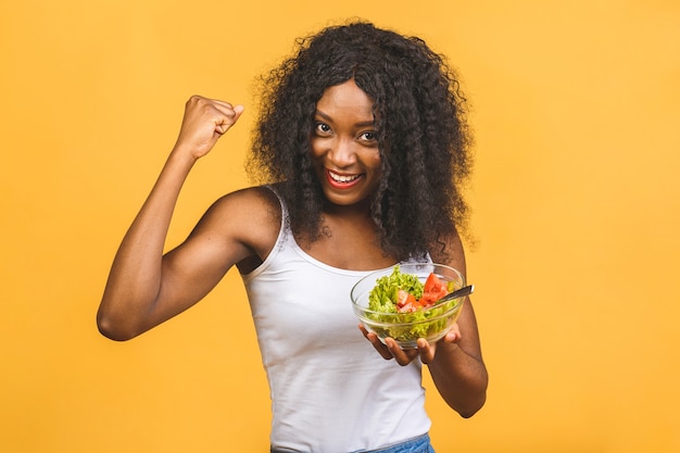 Beautiful African American black Woman Eating Salad