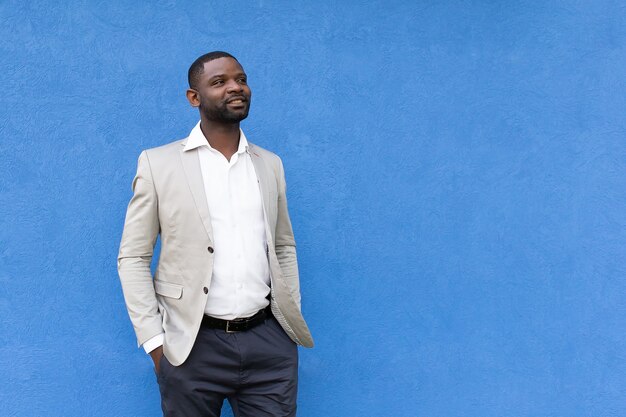 The beautiful African American on a blue background