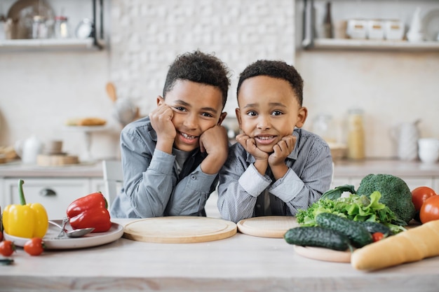 Premium Photo | Beautiful african american children preparing healthy