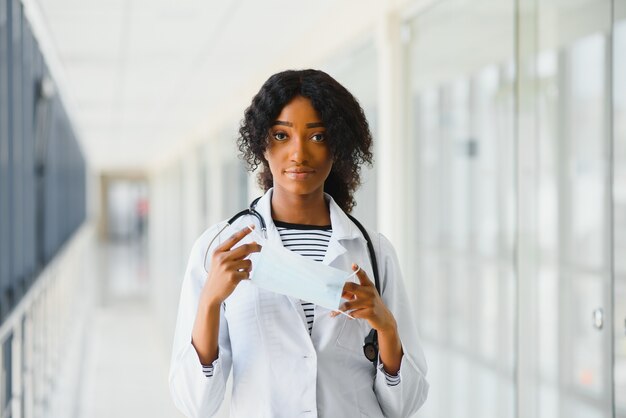 Beautiful african american female pediatric nurse in modern office