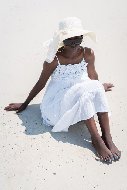 Beautiful African American girl on sea beach