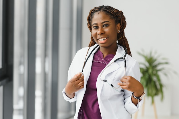 Beautiful african american nurse with arms folded