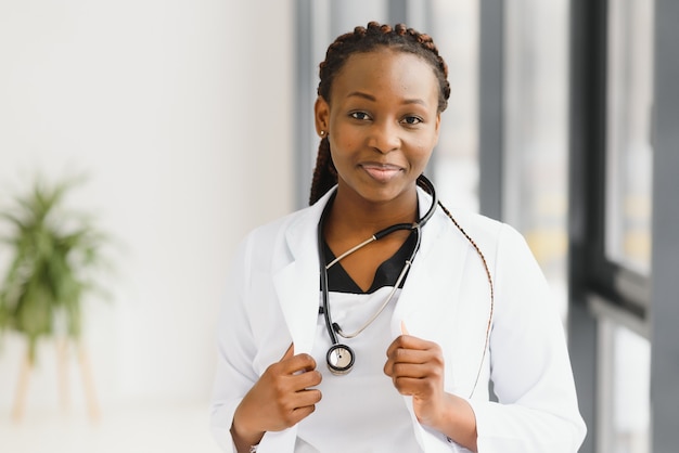 Beautiful african american nurse with arms folded