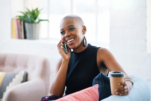 Beautiful african american woman using smartphone having phone call smiling enjoying conversation