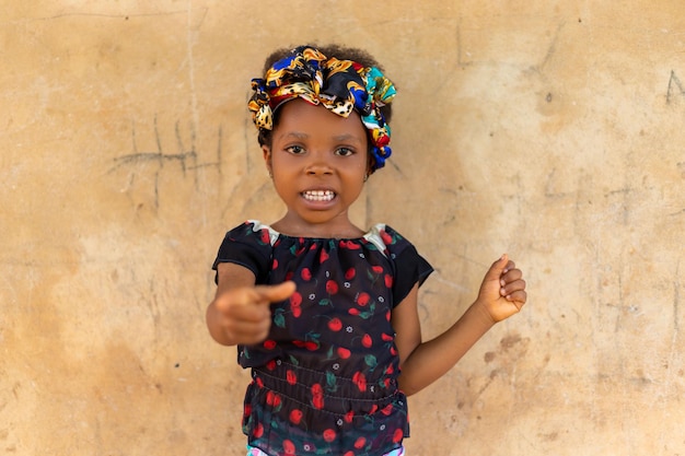 Beautiful african baby outdoor pointing