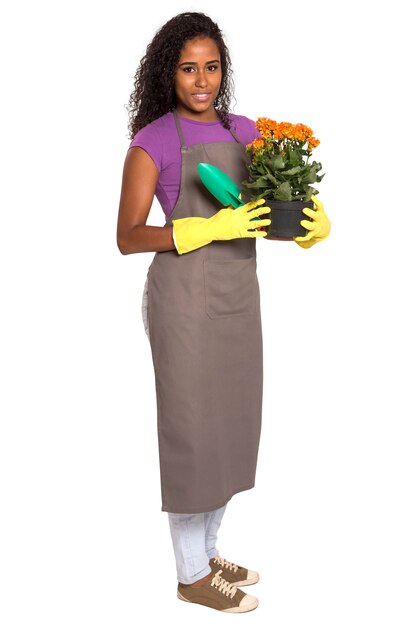 Beautiful African girl gardener with flower isolated