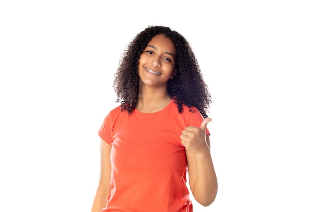 Beautiful african teenager with afro hair isolated on a white background