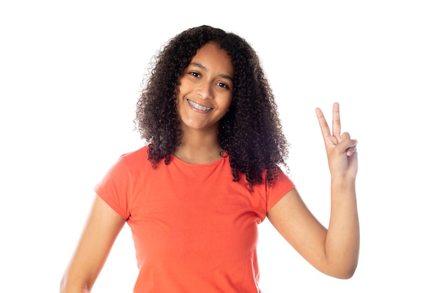 Beautiful african teenager with afro hair isolated on a white background