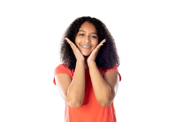 Beautiful african teenager with afro hair isolated on a white background