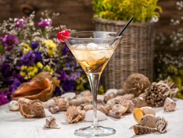 Beautiful alcoholic cocktail, on a wooden table