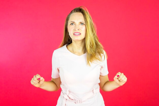 Beautiful angry woman looks furious