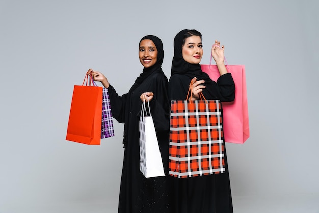 Beautiful arab middleeastern women with traditional abaya in studio