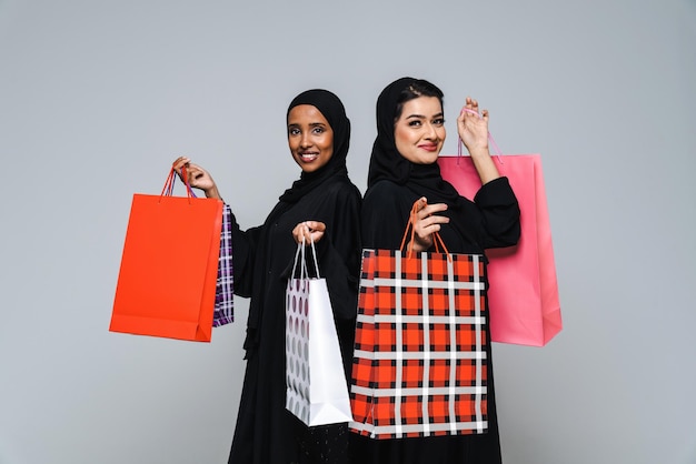 Beautiful arab middleeastern women with traditional abaya in studio