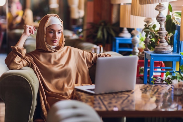 Beautiful arabic business woman working on computer