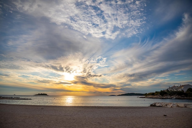 Beautiful area lozica of rogoznica town with sandy beach white architecture and fishing boats at sun...