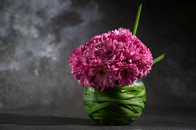 Beautiful arrangement of flowers in ikebana style