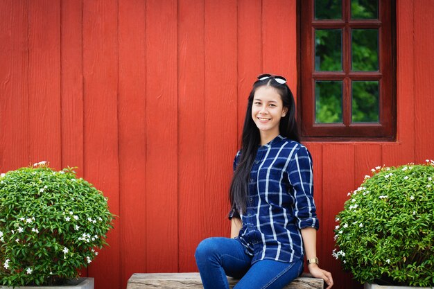 beautiful Asia woman,girl posing,make gestures with fun and happy in the garden