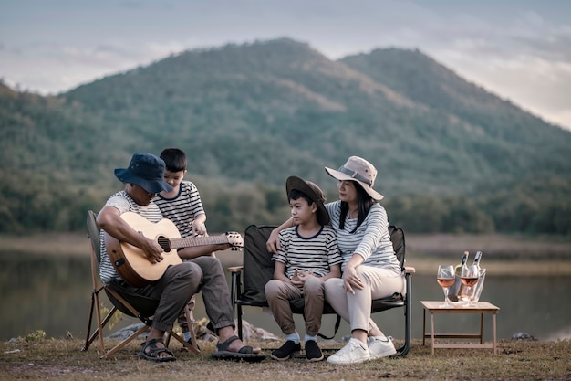 Beautiful Asian family and son doing picnic