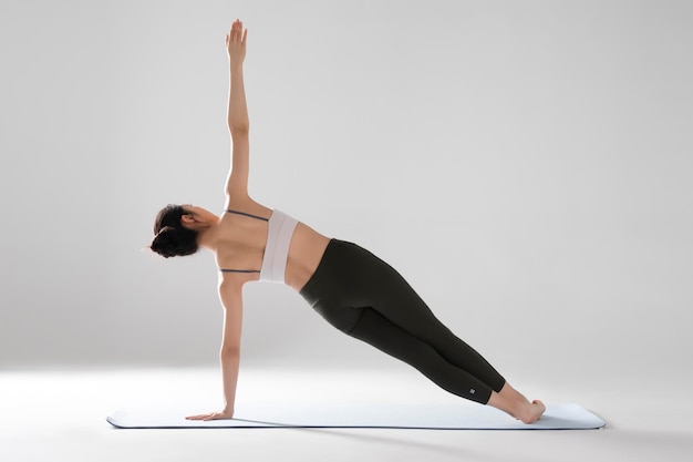 Beautiful Asian girl practicing yoga