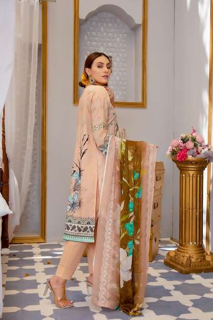 Beautiful Asian Girl Side Pose Wearing Trendy Floral Shalwar Kameez for Traditional Photoshoot