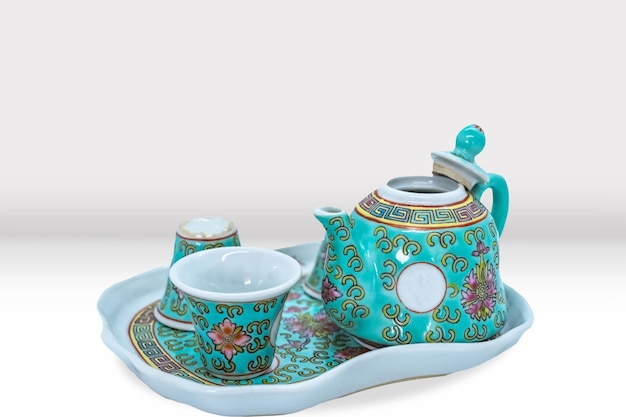 Photo beautiful asian tea pot and cup set with floral patterns mocku