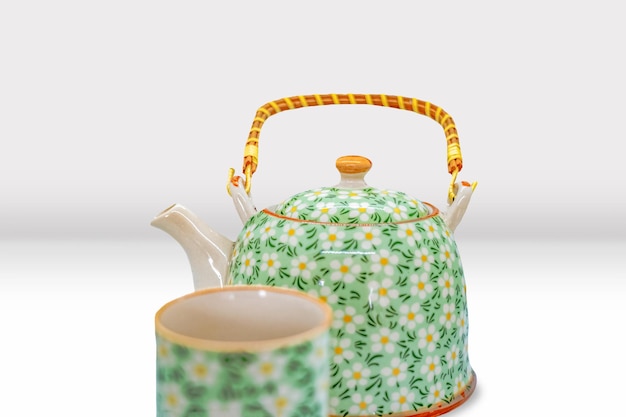 Photo beautiful asian tea pot and cup set with floral patterns mockup