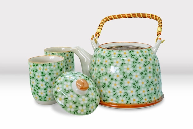 Photo beautiful asian tea pot and cup set with floral patterns mockup