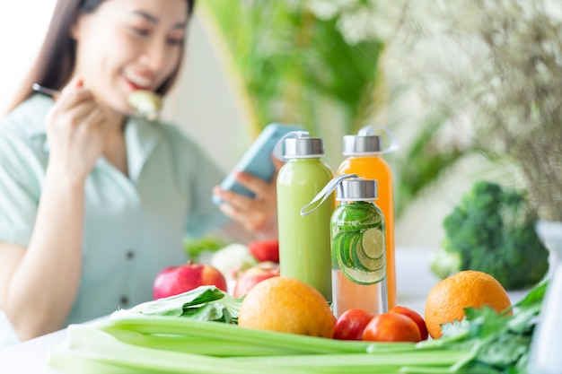 Beautiful Asian woman enjoying a plant-based meal