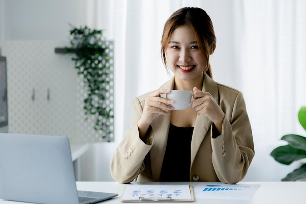 Beautiful Asian woman is a businesswoman who leads a new generation of startups a woman who runs and manages a business plan to build confidence and stability in business womanled business concept